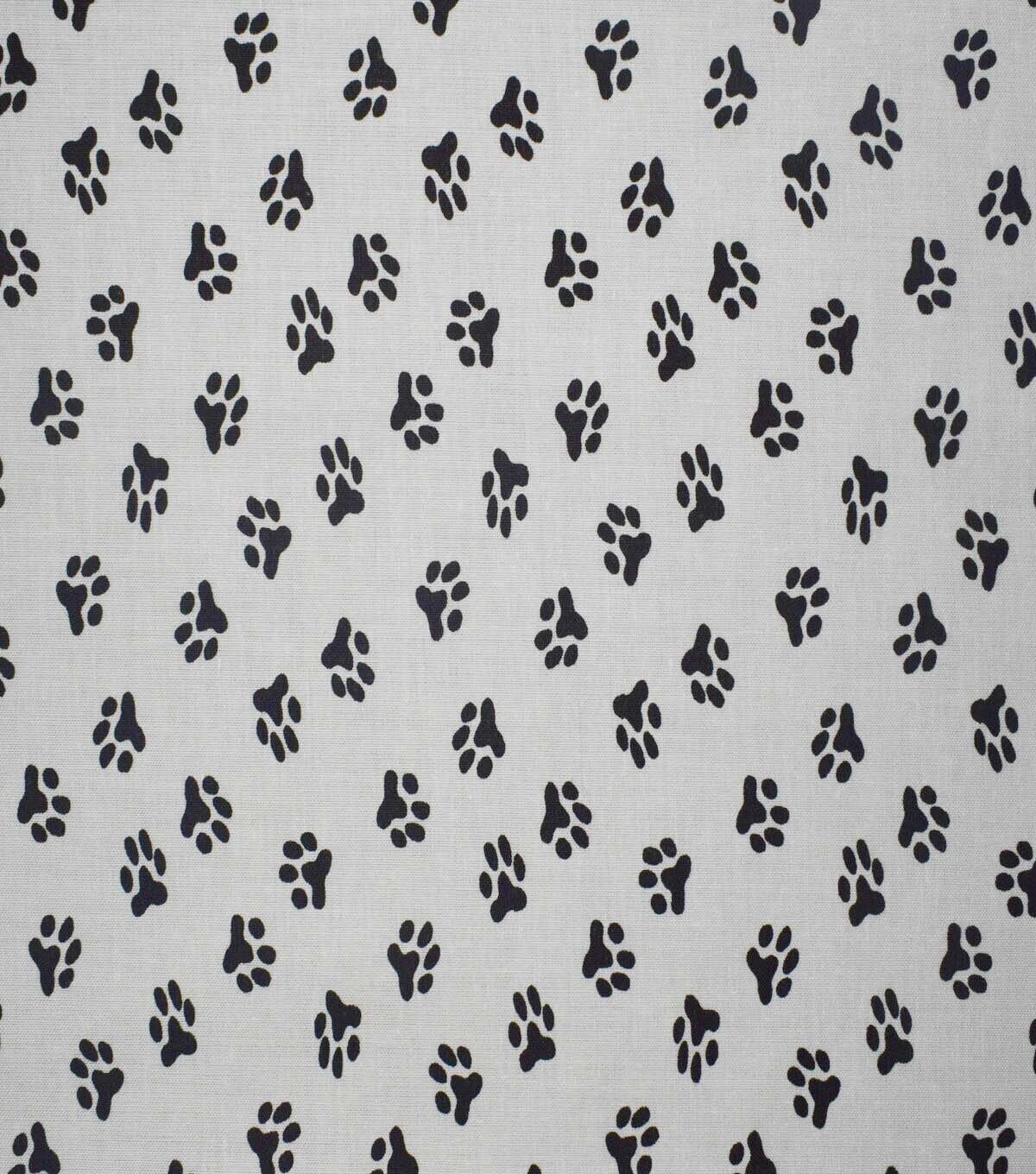 Paw Print on White Cotton Fabric by Quilter s Showcase