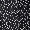 Dog Bones on Black Cotton Fabric by Quilter s Showcase